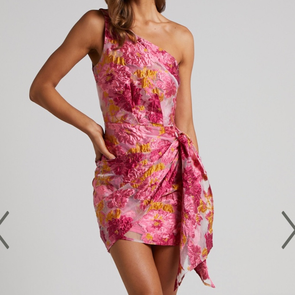 SHOWPO| BRAILEY ONE SHOULDER WRAP FRONT MINI DRESS IN PINK JACQUARD
